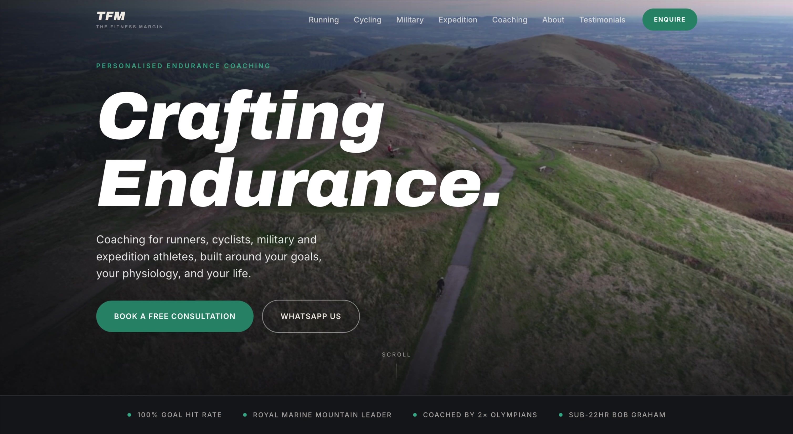 The Fitness Margin homepage: 'Crafting Endurance' over an aerial of the Malvern Hills with a cyclist on the ridge trail. A credentials bar reads 100% goal hit rate, Royal Marine Mountain Leader, coached by 2× Olympians, sub-22hr Bob Graham.